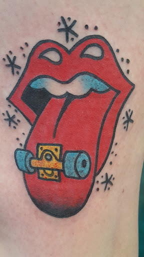 Explore dog sleeve tattoo ideas, creative tattoo ideas in Reno, available at Aces Tattoo