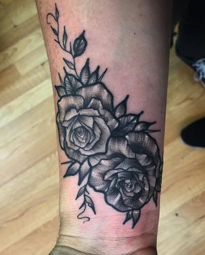 Explore bow and arrow tattoo ideas, creative tattoo ideas in Chicago, available at Mind Crusher Tattoo