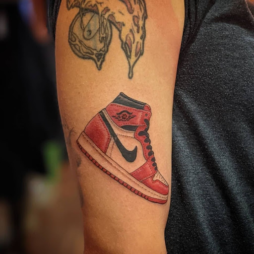 Explore ideas for a first tattoo for guys, creative tattoo ideas in Rochester, available at Axe of Kindness Tattoo