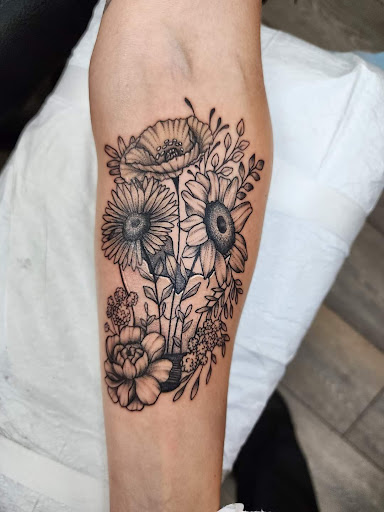 Explore bridge tattoo ideas, creative tattoo ideas in Dubuque, available at The Crows Nest