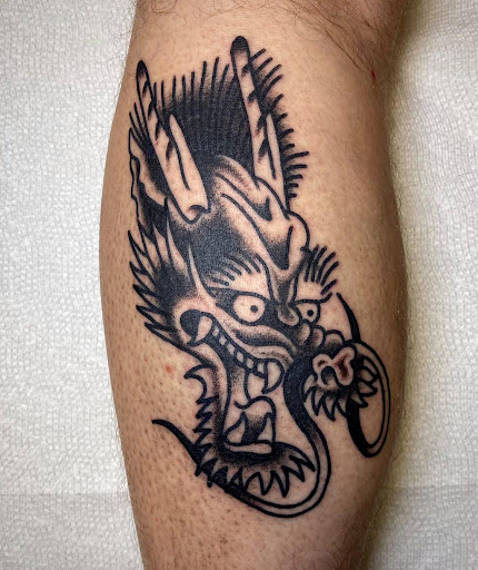 Explore dog tattoo ideas, creative tattoo ideas in Seymour, available at 3 Sevens Tattoo