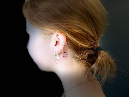 Explore behind the ear tattoo ideas, creative tattoo ideas in High Ridge, available at Taylored ink