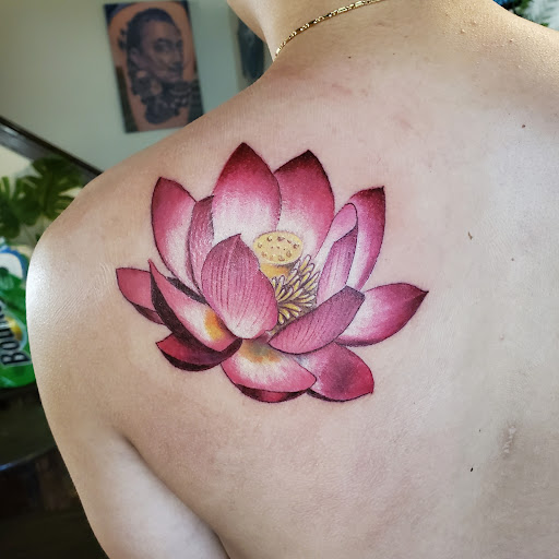 Explore back flower tattoo ideas, creative tattoo ideas in Bellingham, available at Beluga Palooza Tattoo