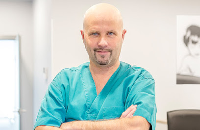Dr Manes Serge - Médecin-dentiste (Implantologue) Luxembourg