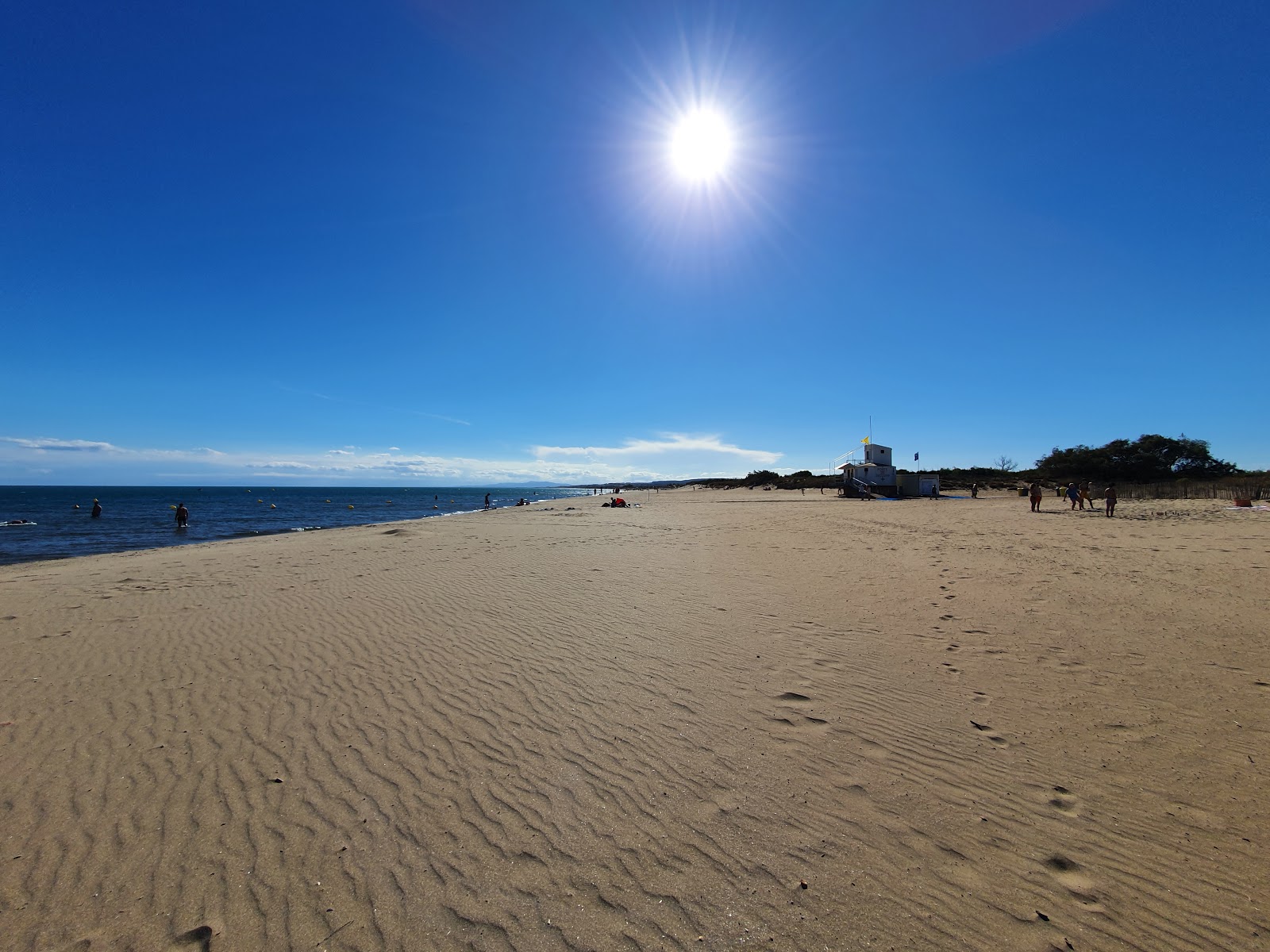 Foto von St. Pierre FKK beach mit lange, gerade küste