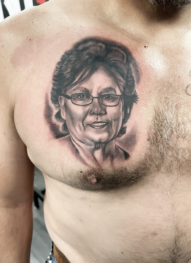 Explore spine tattoo ideas for men, creative tattoo ideas in Silver City, available at Independent Ink Tattoo