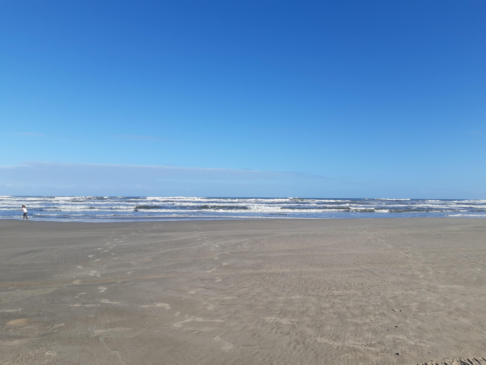 Fotografija Praia Lagoinhas z svetel fin pesek površino