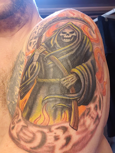 Explore lotus tattoo ideas, creative tattoo ideas in Grand Haven, available at Primm & Proper Custom Tattoo & Piercing