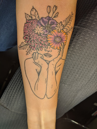 Explore rose cover up tattoo ideas, creative tattoo ideas in Amarillo, available at Puppeteer Ink Tattoo Studio