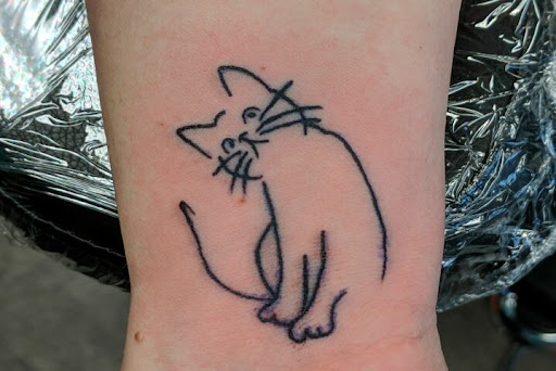 Explore skinny tattoo ideas, creative tattoo ideas in Madison, available at Black Sapphire Tattoo