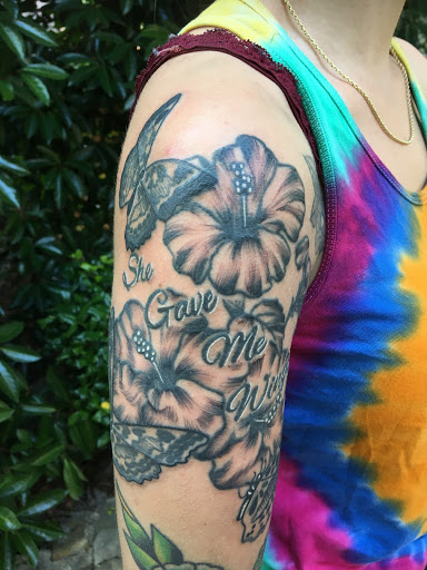 Explore black belt tattoo ideas, creative tattoo ideas in Chapel Hill, available at Golden Falcon Tattoo and Piercing