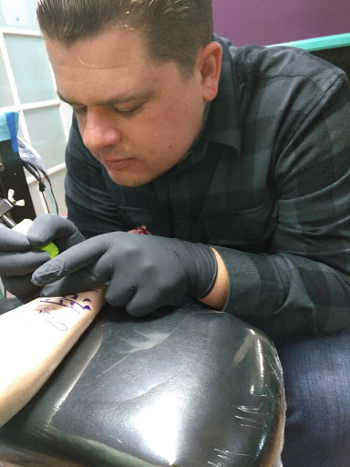 Explore small mens tattoo ideas, creative tattoo ideas in Bullhead City, available at Belton Tattoo