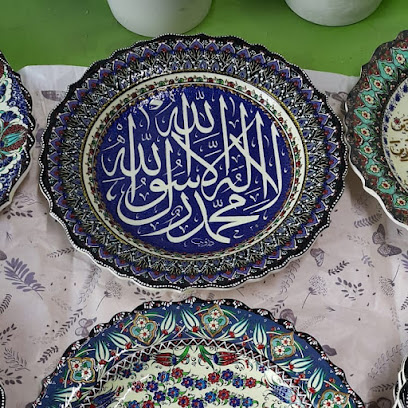Amangku kaligrafi dekoratif
