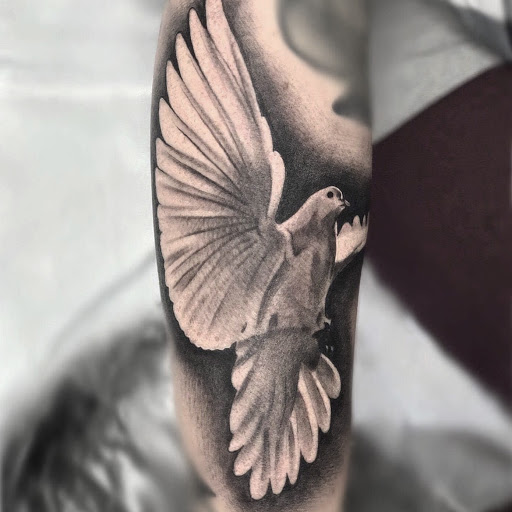 Explore pet memorial tattoo ideas, creative tattoo ideas in Loveland, available at R&G Body Art