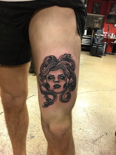 Explore batman logo tattoo ideas, creative tattoo ideas in Dallas, available at Controversy Ink Tattoo Studio