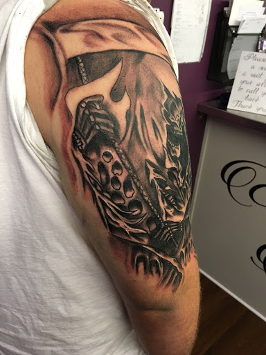 Explore mens arm sleeve tattoo ideas, creative tattoo ideas in Roscoe, available at Elevated Ink Tattoo