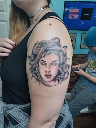 Explore 1975 tattoo ideas, creative tattoo ideas in Calhoun, available at Velvet Panther Tattoo and Piercing