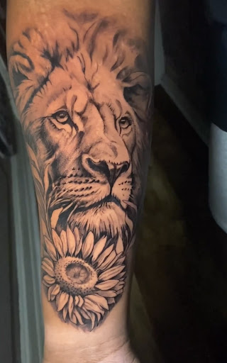 Explore tattoo tribal sleeve ideas, creative tattoo ideas in Baltimore, available at Rippd Canvas Tattoo Shop Artists Social Club