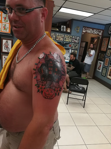 Tattoo Shop «Rise Above Tattoo», reviews and photos, 1009 N Mills Ave, Orlando, FL 32803, USA