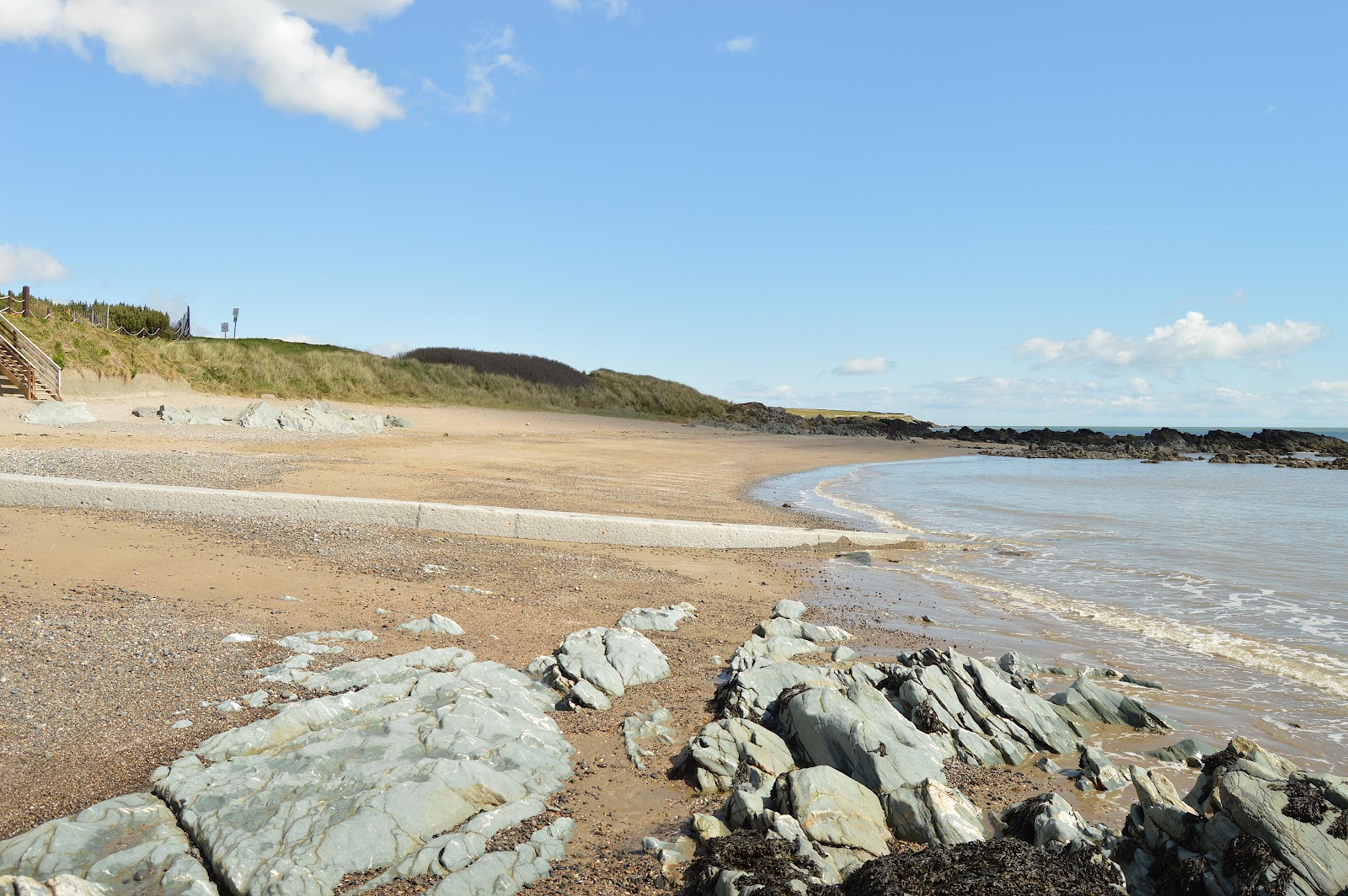 Photo of Donabate beach with light sand &  pebble surface