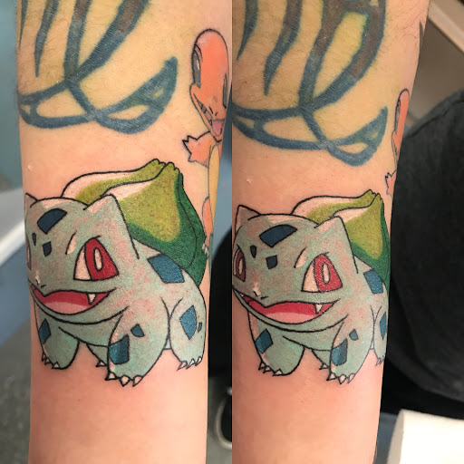 Explore dark skin male black skin tattoo ideas, creative tattoo ideas in Muncie, available at The Tattoo Studio