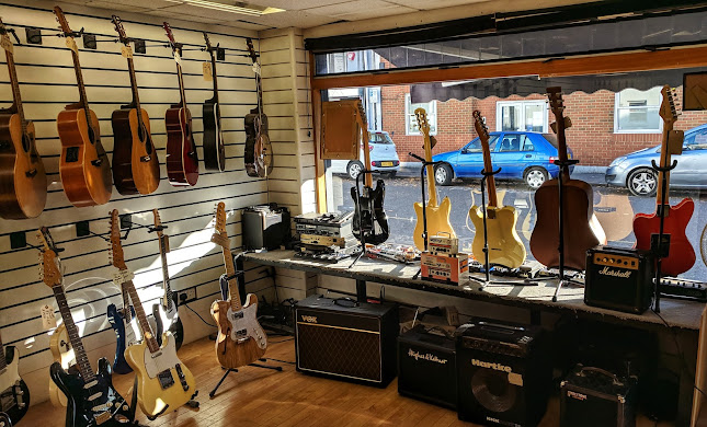 Woody's Music - Guitars & Repairs - Brighton