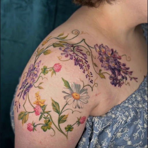 Explore tattoo ideas for female sleeve, creative tattoo ideas in Asheboro, available at Wonderland Tattoo