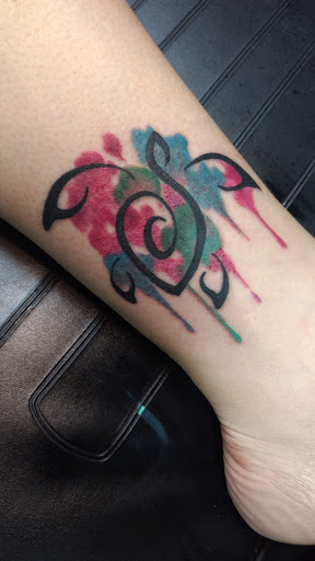 Explore hunger games tattoo ideas, creative tattoo ideas in Kailua Kona, available at Big Island Tattoo & Piercing