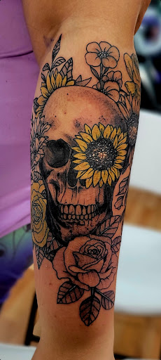 Explore ladies foot tattoo ideas, creative tattoo ideas in Benton, available at Spectrum Tattoo