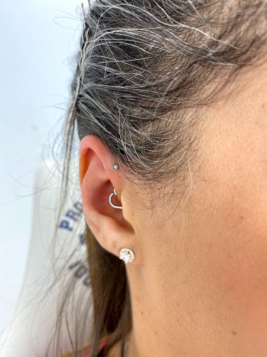 Explore march birth flower tattoo ideas, creative tattoo ideas in Myrtle Beach, available at Professional Body Piercing by Jackie