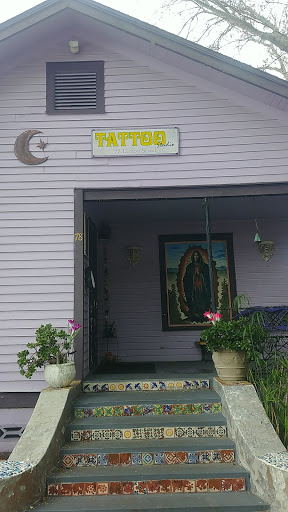 Explore yellow rose tattoo ideas, creative tattoo ideas in Saint Augustine, available at Ms. Deborahs Fountain of Youth Tattoo & Body Piercing