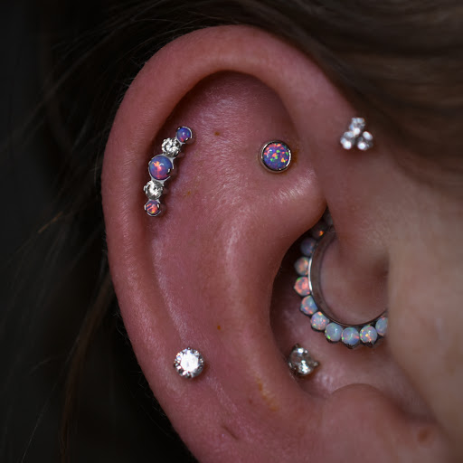 Explore brown pride tattoo ideas, creative tattoo ideas in Reno, available at Black Hole Body Piercing