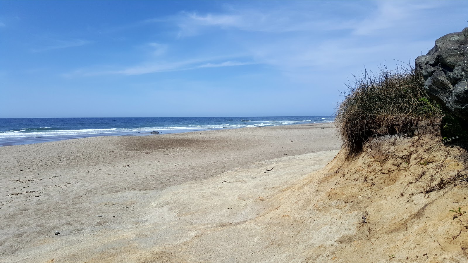 Φωτογραφία του Lincoln Beach με φωτεινή άμμος επιφάνεια