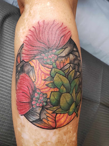 Explore cover up tattoo ideas for lower back, creative tattoo ideas in Pahoa, available at Electric Jungle Tattoo