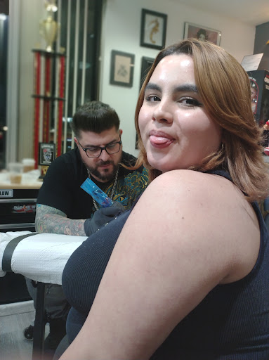 Explore fist bump tattoo ideas, creative tattoo ideas in Henrico, available at West End Tattoo & Piercing