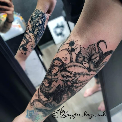 Explore racing tattoo ideas, creative tattoo ideas in Casper, available at Luna & Lotus Amethyst Ink Angie Kay