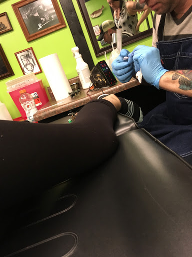 Explore wu tang tattoo ideas, creative tattoo ideas in Hernando, available at Blue Panther Tattoo Co