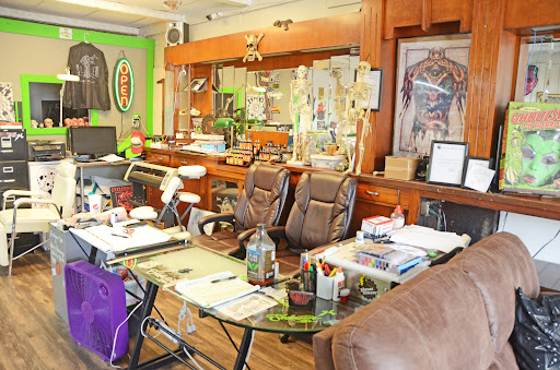 Explore jester tattoo ideas, creative tattoo ideas in Decatur, available at Exclusive Ink Tattoos & Body Piercings 22nd & Wood