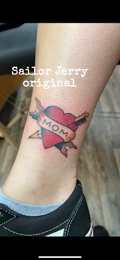 Explore tattoo ideas on spine, creative tattoo ideas in Vincennes, available at Silver Owl Tattoo