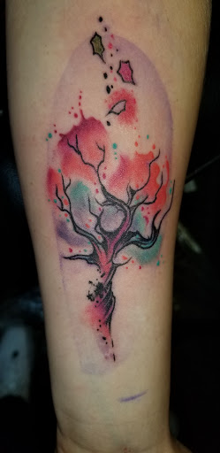 Explore apollo tattoo ideas, creative tattoo ideas in Angola, available at Hoodlum Ink