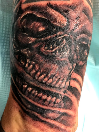 Explore cover up tattoo ideas back, creative tattoo ideas in Seymour, available at American Gypsy Tattoo Corp.