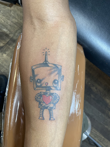 Explore men's back tattoos ideas, creative tattoo ideas in Denver, available at World Tattoo Studio