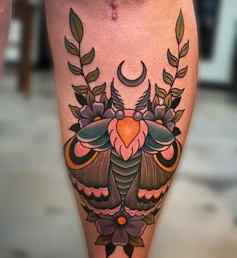 Find moth tattoo ideas for your next unique tattoo in Council Bluffs at Crimson City Tattoo