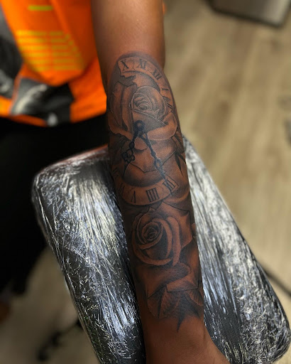 Explore tattoo ideas symbolizing strength, creative tattoo ideas in Apple Valley, available at 21st Vintage Tattoo