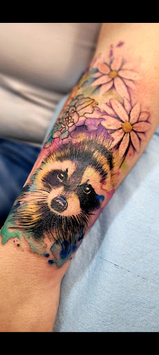 Explore upper back tattoo ideas male, creative tattoo ideas in Benton, available at Spectrum Tattoo