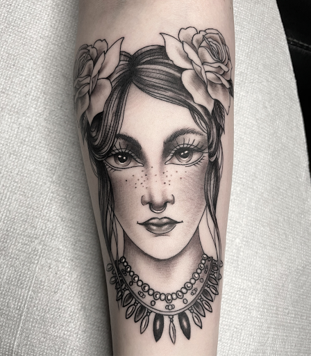 Explore religious sleeve tattoo ideas, creative tattoo ideas in Edgewood, available at Wild Coyote Tattoo