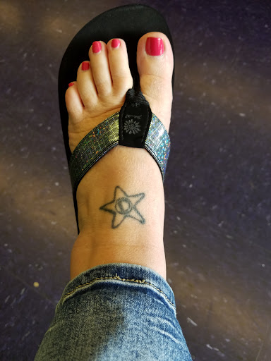 Explore tattoo ideas for women on thigh, creative tattoo ideas in Knoxville, available at Tough Luck Tattoos