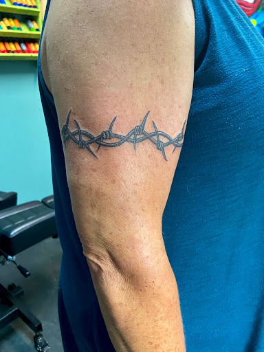 Explore silver lining tattoo ideas, creative tattoo ideas in Meridian, available at Creative Pain Tattoo Studio