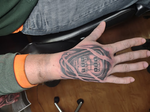 Explore grandmother tattoo ideas, creative tattoo ideas in Williamston, available at Inkd Tattoo Parlor