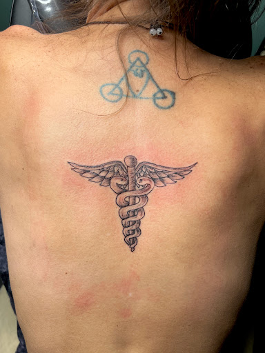 Explore maltese cross tattoo ideas, creative tattoo ideas in Meridian, available at Creative Pain Tattoo Studio